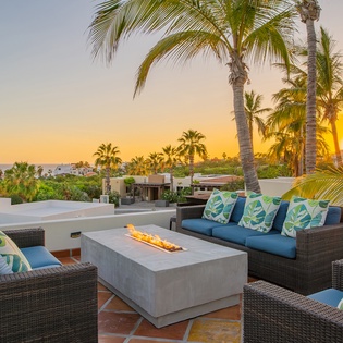 Rooftop of villa with a fire pit and incredible ocean views