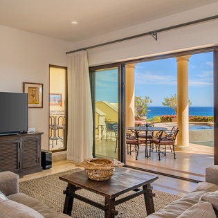 Family area with access to patio and ocean views