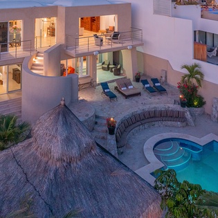 Poolside with jacuzzi during sunset