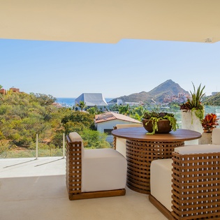 Your private terrace offers stunning views where you can enjoy morning coffee surrounded by tropical beauty and ocean vistas.