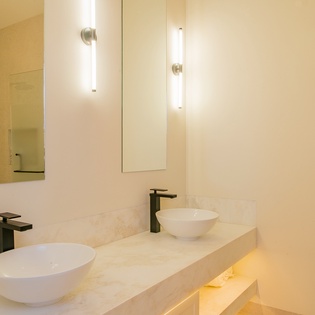 En suite bathroom with double sink
