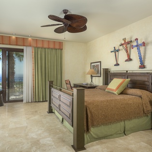 Bedroom suite with pocket door and ocean view