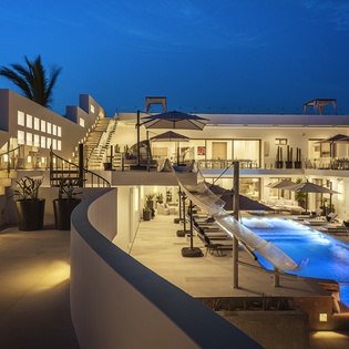 Night time views of patio and poolside