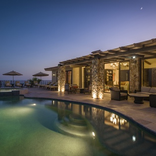 Infinity pool with city and ocean view