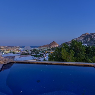 Pool and jacuzzi overlooking ocean views