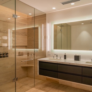 En suite bathroom with walk in shower and bathroom