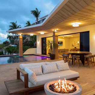Modern pool deck with fire pit