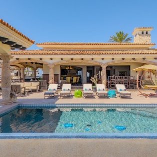 Luxurious Mediterranean villa with private pool, elegant architecture, and stunning outdoor entertaining spaces in an exclusive resort setting.