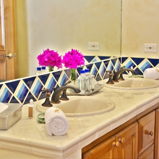 En suite bathroom with double sink
