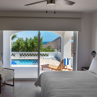 Bedroom suite with patio access
