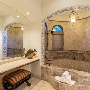 En suite bathroom with bath tub
