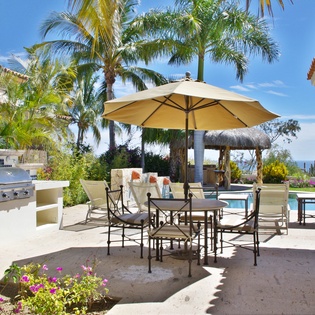 Sunny outdoor dining with BBQ