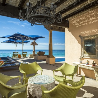 Your private terrace offers front-row seats to paradise, where turquoise waters meet endless blue skies just steps from your door.