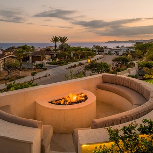 Fire pit with ocean views and spacious seating