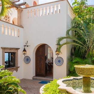 Villa courtyard entrance with fountain