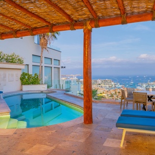 Lounge poolside with ocean view