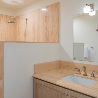 En suite bathroom with walk in shower