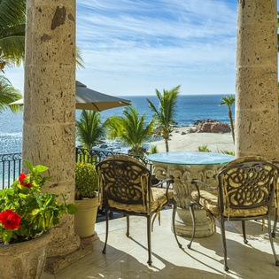 Outdoor seating with beachfront views