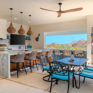 Dining area and kitchen with bar seating