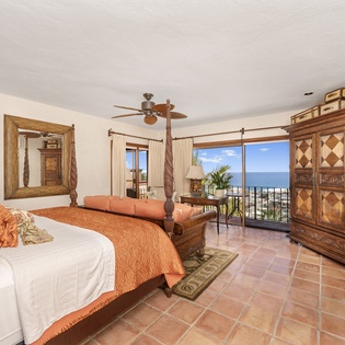 Bedroom suite with terrace access and ocean views