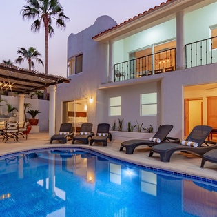 Inviting outdoor terrace with swimming pool, jacuzzi and patio furniture