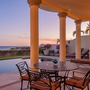 Patio with outdoor seating and ocean views