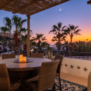 Outdoor dining over looking a gorgeous sunset view