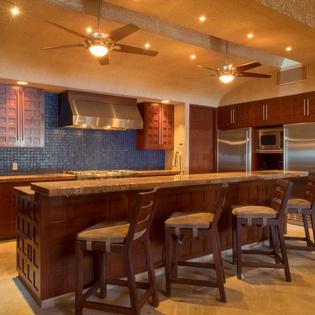 Spacious kitchen with bar stools-20