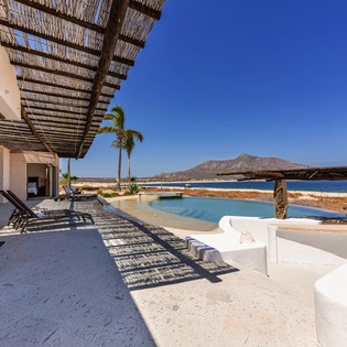 Poolside patio with ocean views