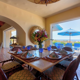 Dining area seating 8 with ocean views