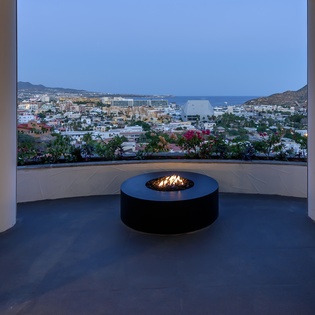 Patio with fire pit and ocean views