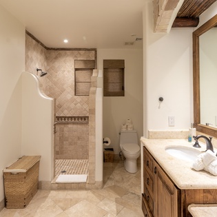 En suite bathroom with walk in shower