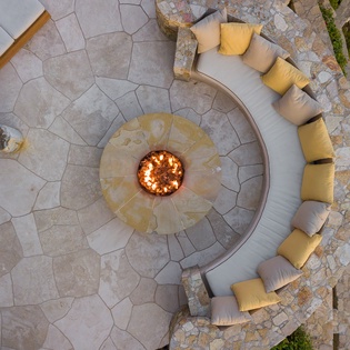 Large outdoor firepit area with seating