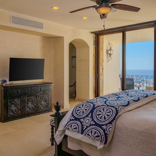 Wake up to breathtaking ocean views from your elegant master suite, where comfort meets luxury with a private balcony.
