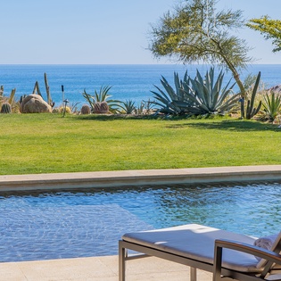 Poolside patio with ocean view