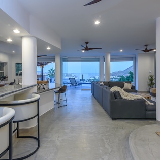 Living area and kitchen with bar seating