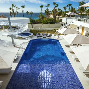 Sunny poolside with ocean views