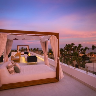 Lay in the daybed while watching the sunset