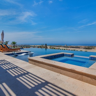 Poolside patio with ocean views