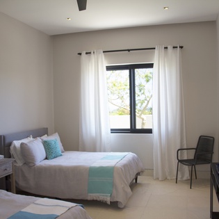 Bedroom suite with two beds