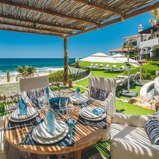 Beach patio with outdoor dining