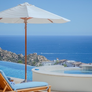 Perfect oceanfront infinity pool with stunning sea views creates your private paradise retreat.