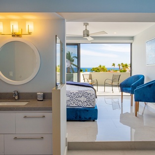 Relax in your modern suite with stunning ocean views from your private balcony and stylish interiors.