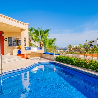 Poolside patio with ocean view