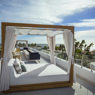 Sunny day bed overlooking the ocean