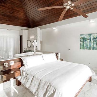 Bedroom at TC AMA, Sapodilla Bay, Turks & Caicos