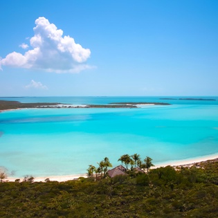 Pristine turquoise waters and white sand beaches create a stunning tropical paradise in this secluded island location.