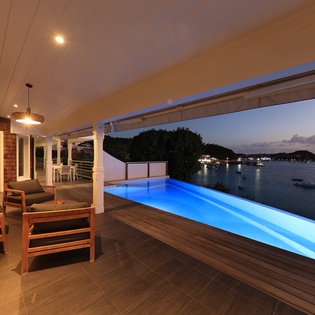 Unwind in your private pool while soaking in breathtaking ocean views from this elegant terrace.