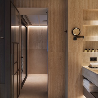 Step into your spa-like bathroom with warm wood tones, luxury amenities, and a spacious walk-in shower that promises pure relaxation.