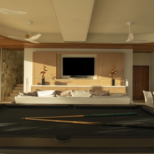 Challenge friends to billiards in your stylish entertainment lounge, complete with plush seating and mountain views.